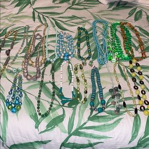 Bundle of green vintage costume jewelry necklaces